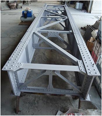 Getting More Out of Existing Structures: Steel Bridge Strengthening via UHPFRC